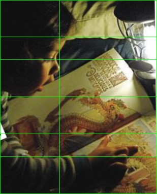 child with book and golden ratio composition lines